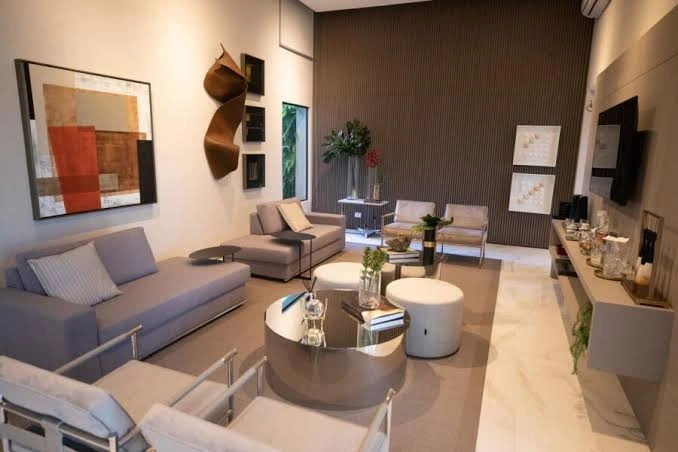 Sala de espera premium e acolhedora da clínica